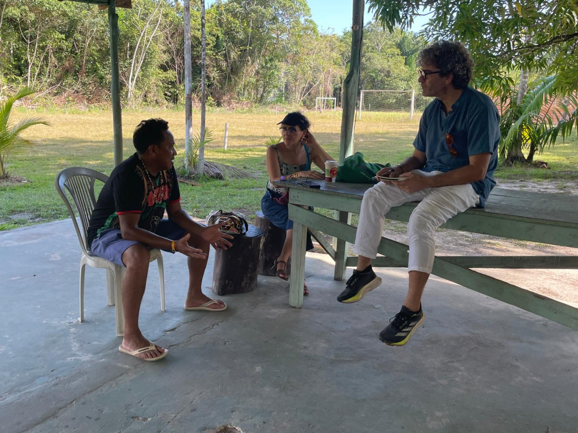 RIFS researchers Bernardo Jurema and Cecília Oliveira speak with community leader Mário Espírito Santo about how a cluster of heavy industries — the Alunorte bauxite refinery, the Albrás aluminium smelter, and the vast CDP Port Complex — has impacted his community and the river they depend on.