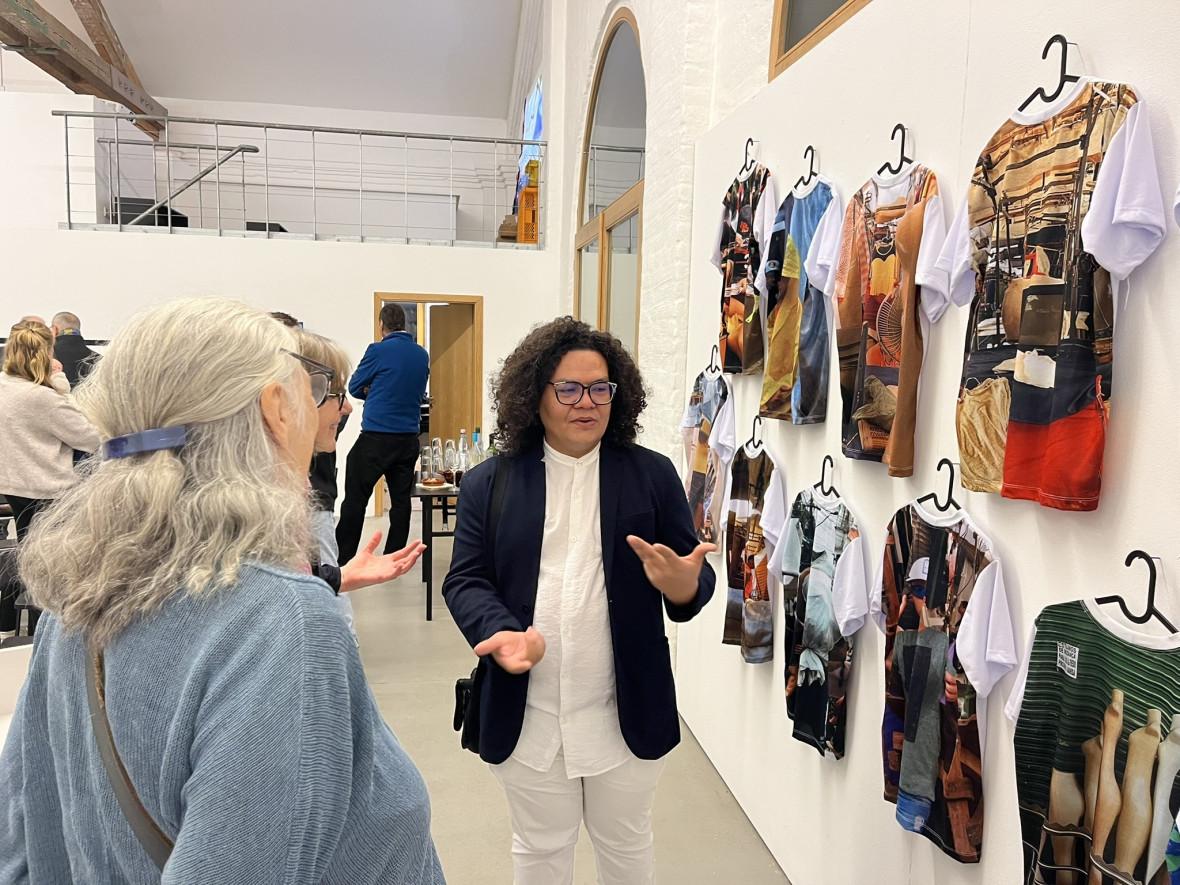 Samir Dams explains his installation "Ocupação dos Mercadores".