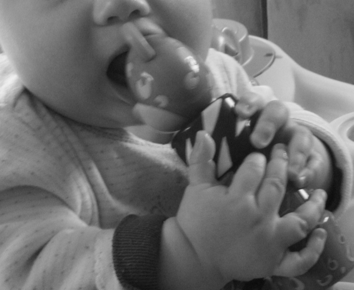 Tim Brown: "Child eating Toy" (Creative Commons, cropped and turned into grayscale)