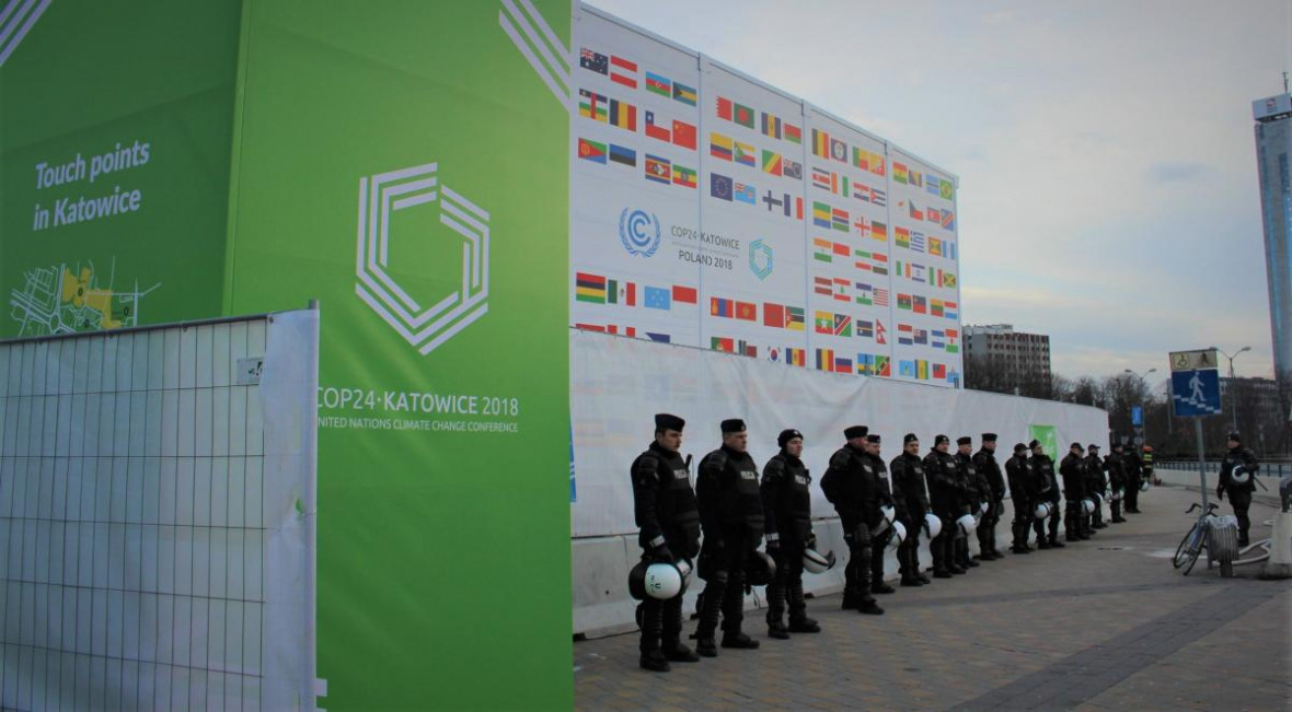 Police stationed outside COP24 during the Climate March. 