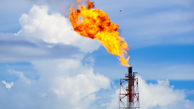 Gas flare at an oil refinery: the fossil fuel industry is a significant source of methane emissions and an important opportunity for mitigation.