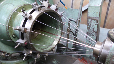 Production of superconducting cables