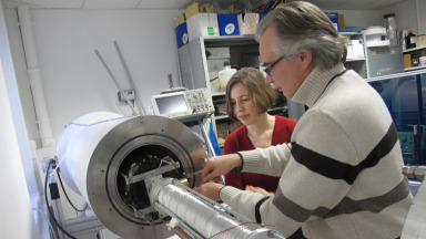 Stéphane Holé (ESPCI Paris) and Adela Marian (IASS) discuss the setup for the space charge tests.  